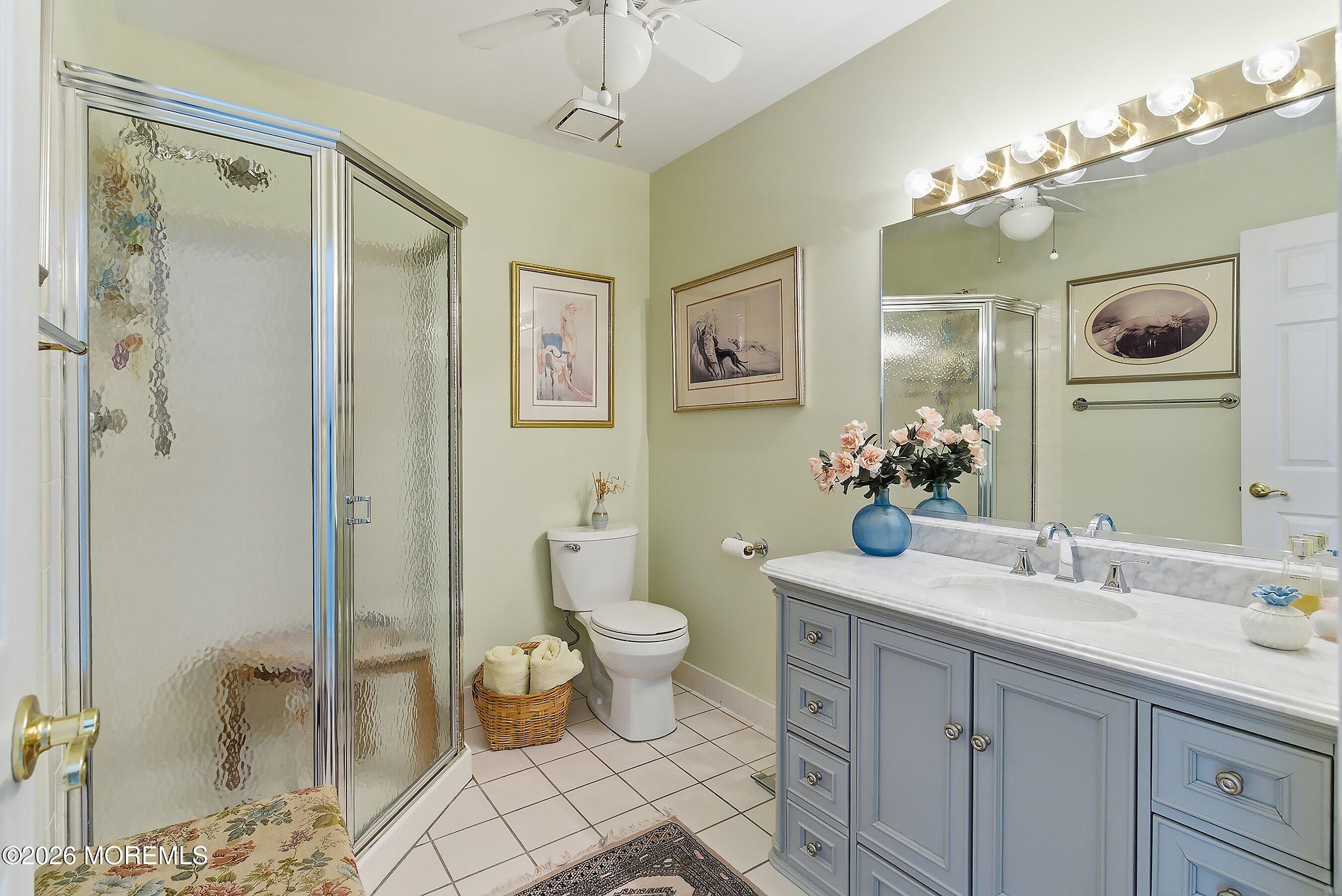 29 Rambling Meadow Court Tinton Falls, NJ 07724 - Photo 24 of 29 a bathroom with a double vanity sink mirror and toilet