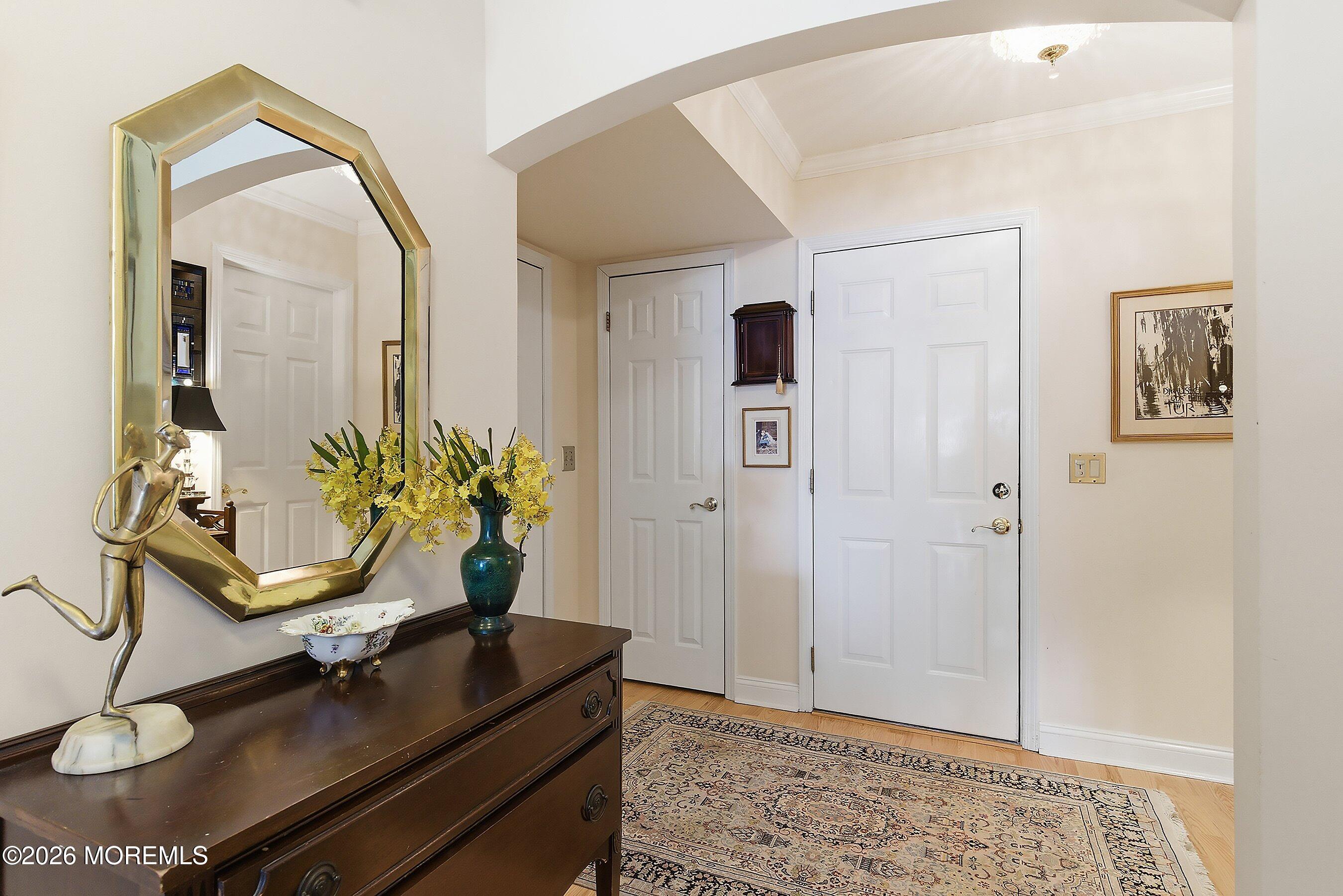 29 Rambling Meadow Court Tinton Falls, NJ 07724 - Photo 5 of 29 a living room with furniture and flowers