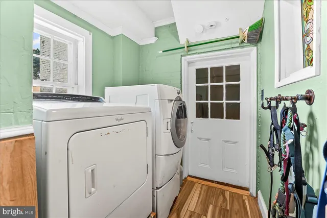 a utility room with dryer and washer