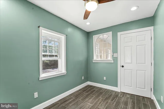 an empty room with windows