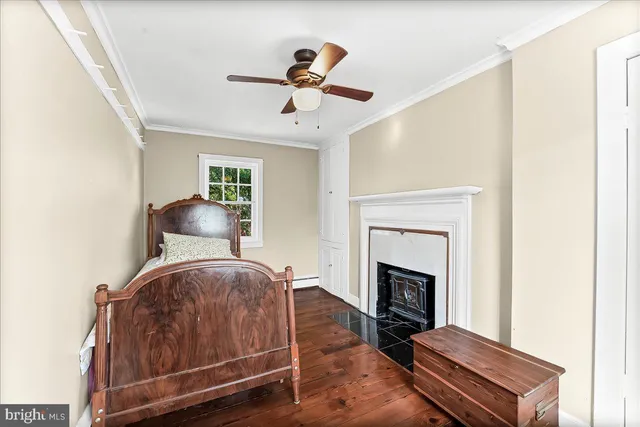 a living room with a couch and a fireplace