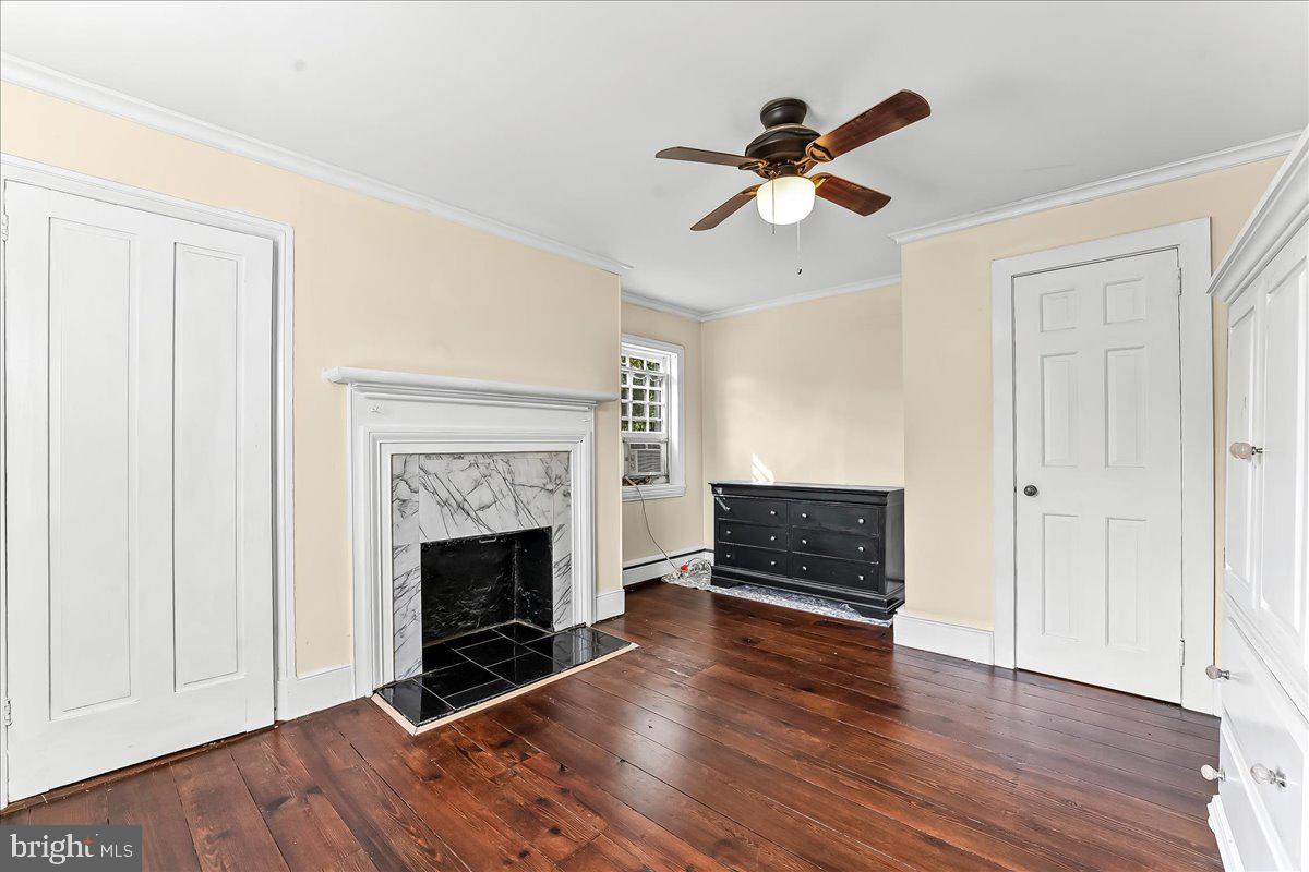 990 Chesterville Road Oxford, PA 19363 - Photo 26 of 47 a living room with furniture and a fireplace