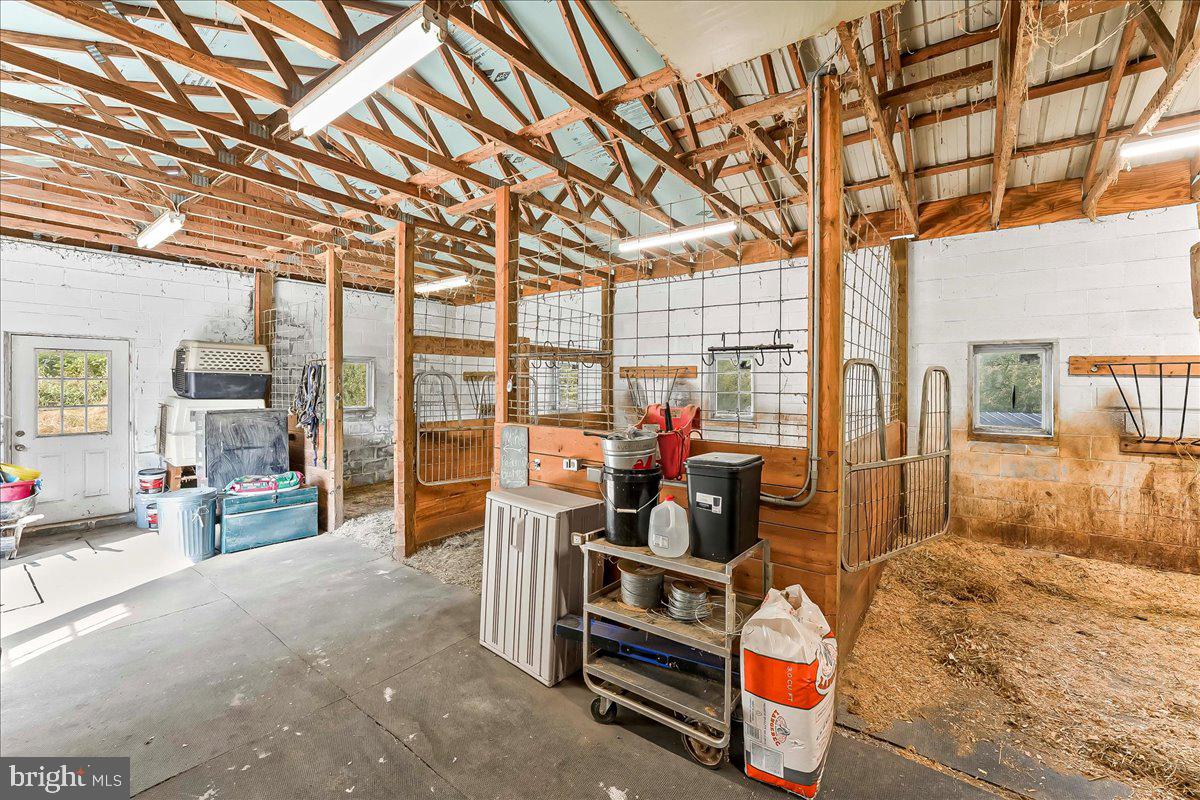 990 Chesterville Road Oxford, PA 19363 - Photo 28 of 47 a living room with furniture and a flat screen tv