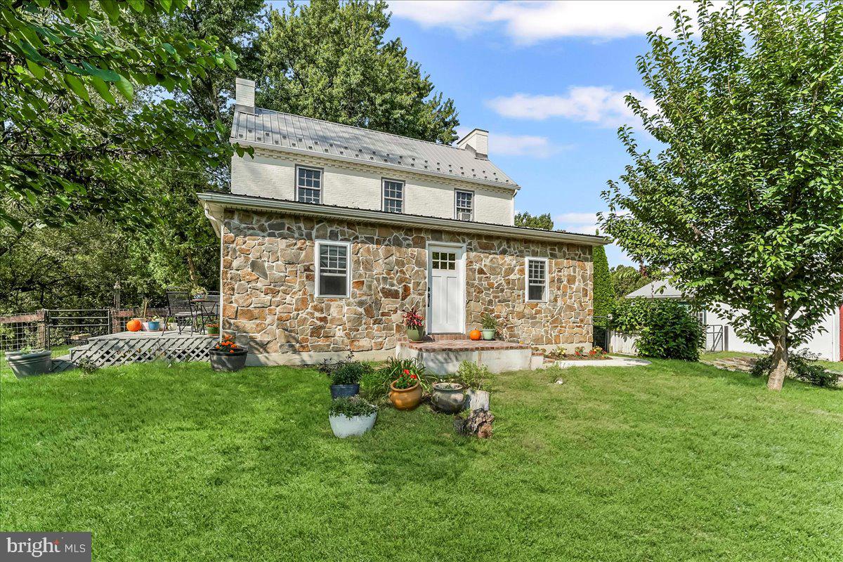 990 Chesterville Road Oxford, PA 19363 - Photo 32 of 47 front view of a house with a yard