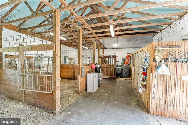 a view of a room with wooden walls