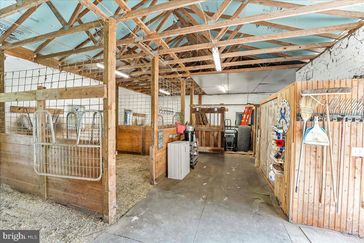 990 Chesterville Road Oxford, PA 19363 - Photo 4 of 47 a view of a room with wooden walls