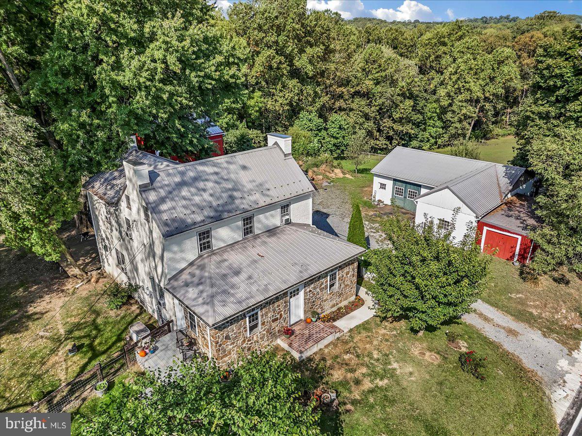 990 Chesterville Road Oxford, PA 19363 - Photo 45 of 47 an aerial view of a house with large trees