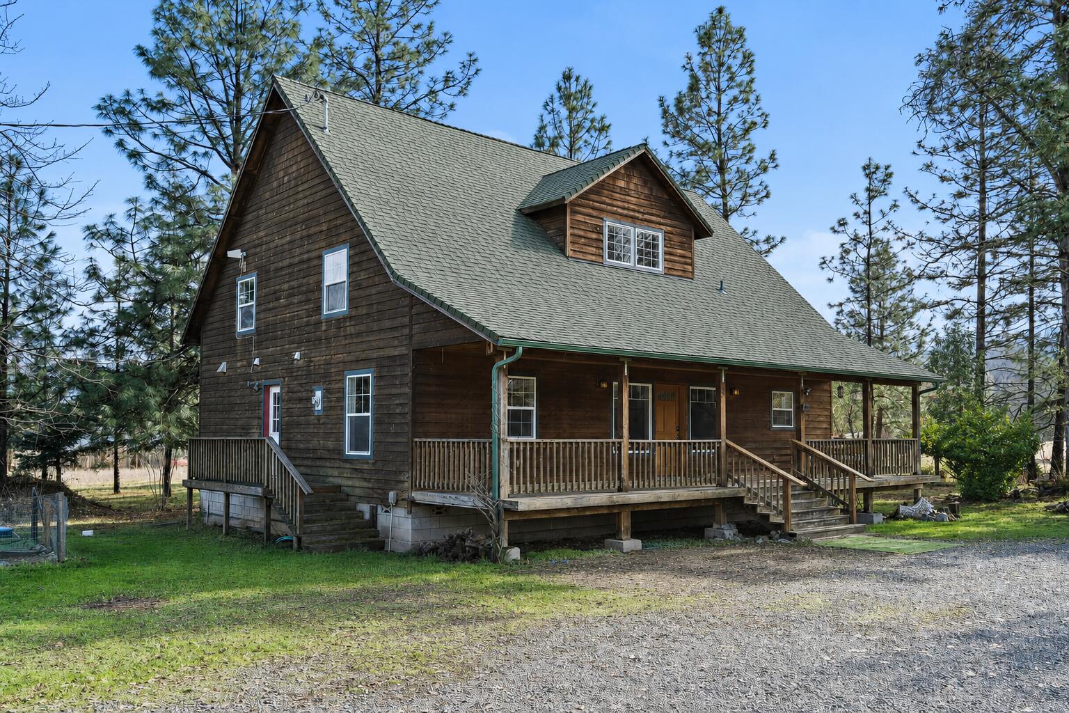 1190 Cedar Flat Road Williams, OR 97544 - Photo 2 of 45 a view of a house with a yard