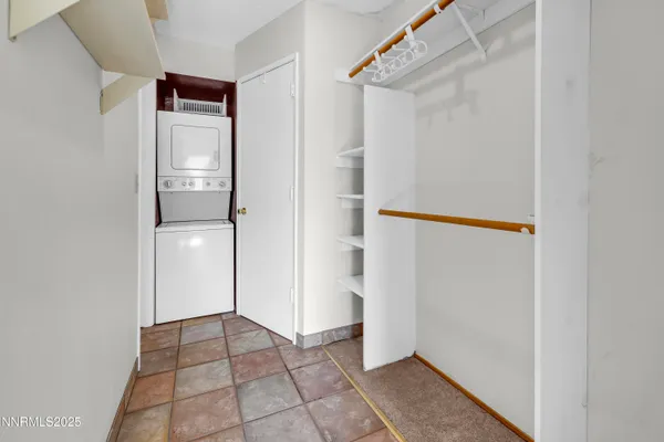 a view of an empty walk in closet