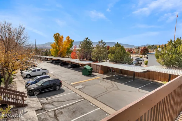 a view of roof deck with sitting area