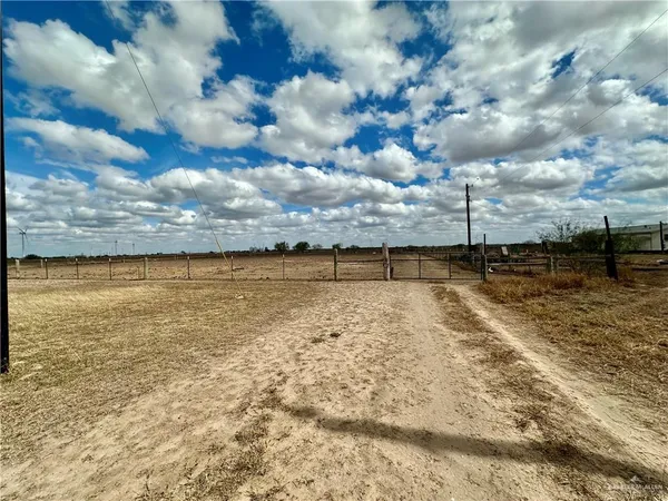a view of swimming pool with outdoor seating