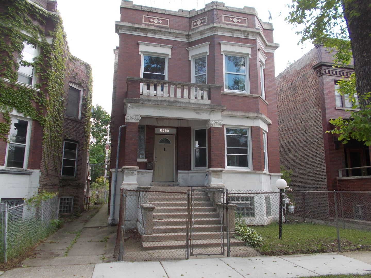 a front view of a house with a porch