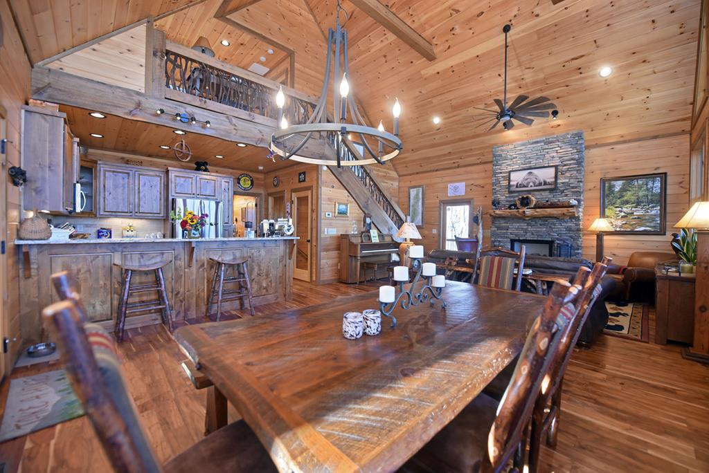 731 Native Trail Cherry Log, GA 30522 - Photo 20 of 56 a dining room with lots of wooden furniture