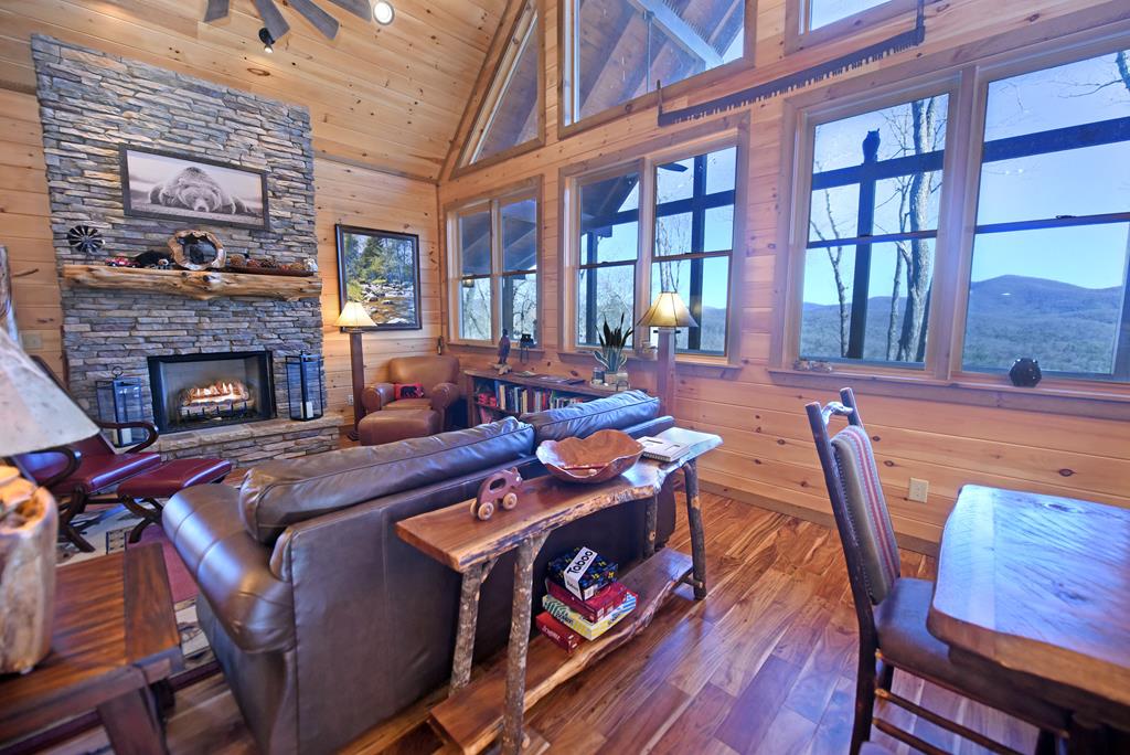 731 Native Trail Cherry Log, GA 30522 - Photo 21 of 56 a living room with furniture fireplace and wooden floor