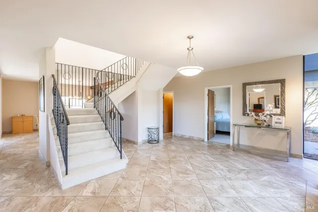 a view of a living room and dining room