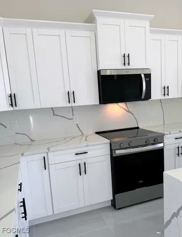 $359,000 | 459 Lockport Avenue South, Lehigh Acres, FL 33974