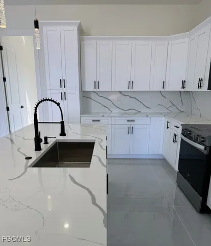 $359,000 | 459 Lockport Avenue South, Lehigh Acres, FL 33974