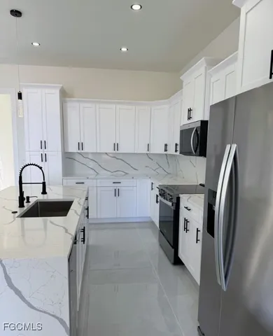 $359,000 | 459 Lockport Avenue South, Lehigh Acres, FL 33974