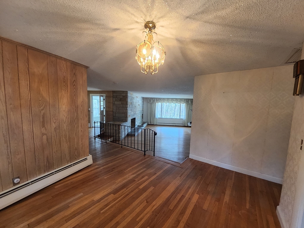 212 Chestnut Street Andover, MA 01810 - Photo 15 of 31 wooden floor in an empty room with a window