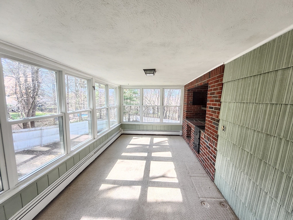 212 Chestnut Street Andover, MA 01810 - Photo 24 of 31 a view of a room with wooden floor and windows