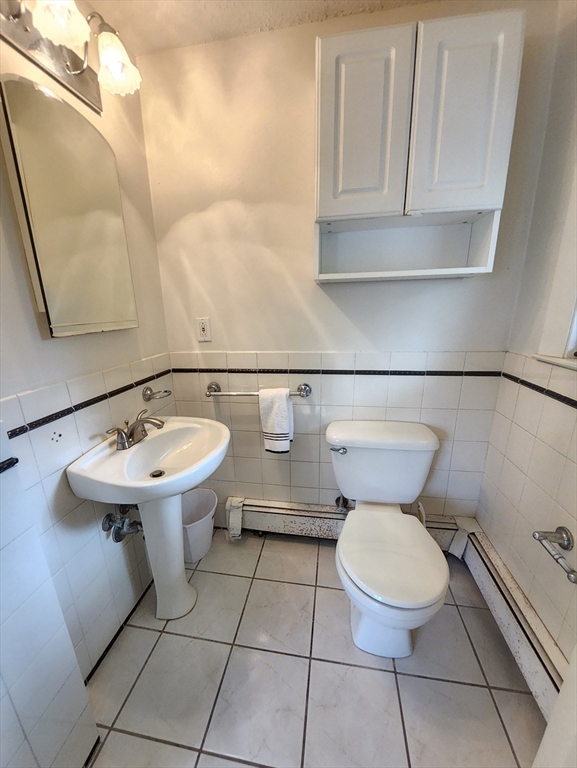 212 Chestnut Street Andover, MA 01810 - Photo 25 of 31 a bathroom with a sink and a toilet