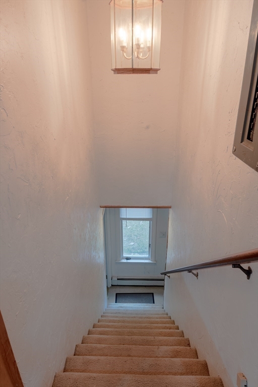 212 Chestnut Street Andover, MA 01810 - Photo 27 of 31 a view of a hallway with closet