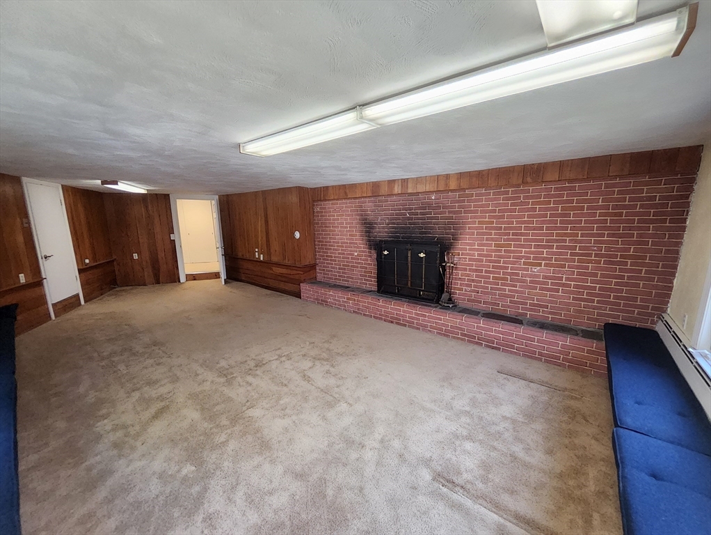 212 Chestnut Street Andover, MA 01810 - Photo 28 of 31 a view of a hall with wooden wall
