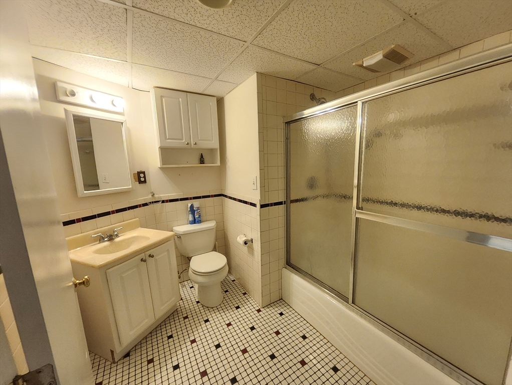 212 Chestnut Street Andover, MA 01810 - Photo 31 of 31 a bathroom with a toilet a sink and a shower