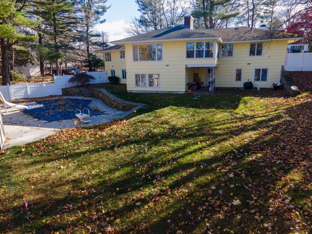 212 Chestnut Street Andover, MA 01810 - Photo 4 of 31 a view of a house with a yard