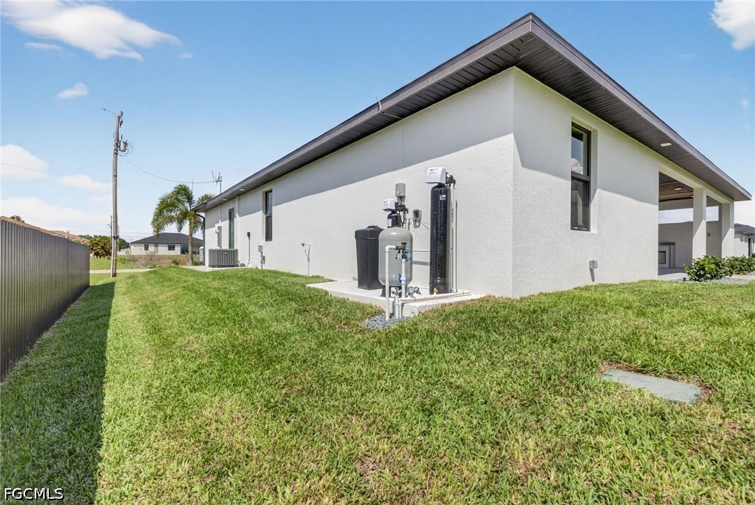 4213 25th Street Southwest Lehigh Acres, FL 33976 - Photo 11 of 47 a house view with backyard space