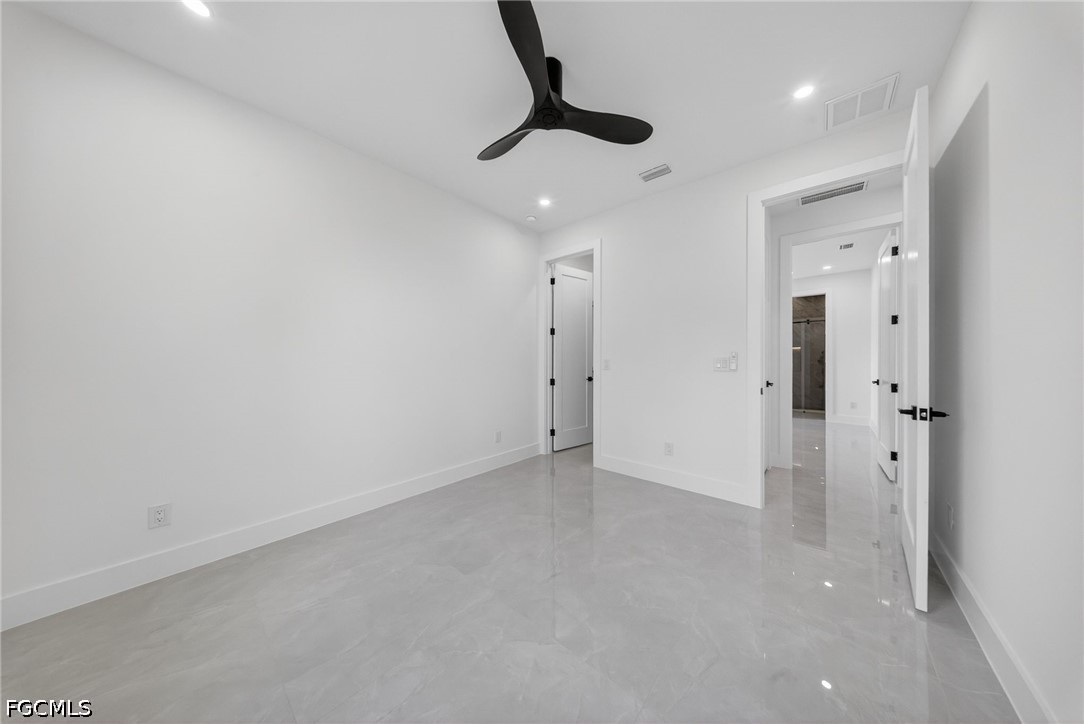 4213 25th Street Southwest Lehigh Acres, FL 33976 - Photo 30 of 47 a view of an empty room