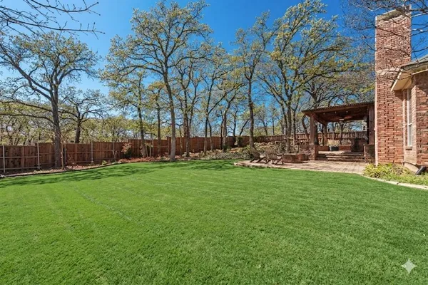 a garden view with outdoor seating
