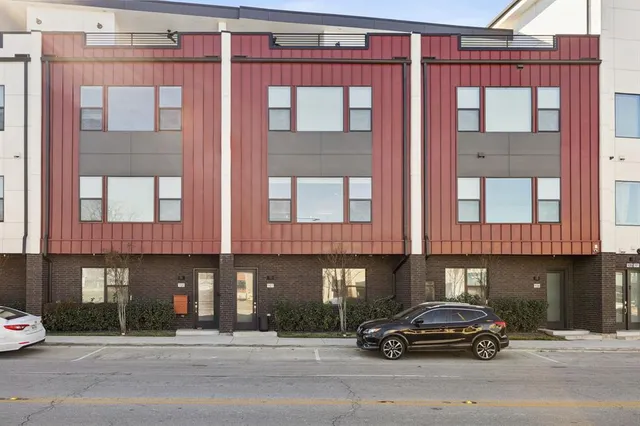 a car parked in front of a building