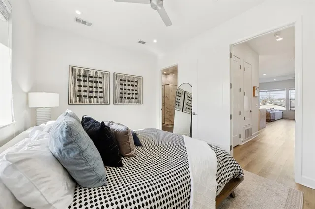 a bedroom with a bed and a walk in closet