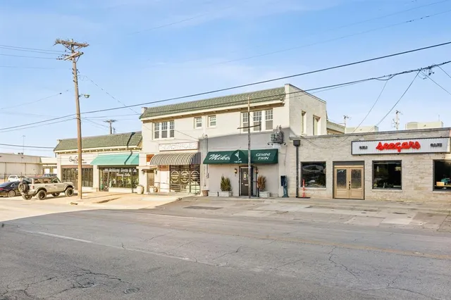 a view of a building with a street