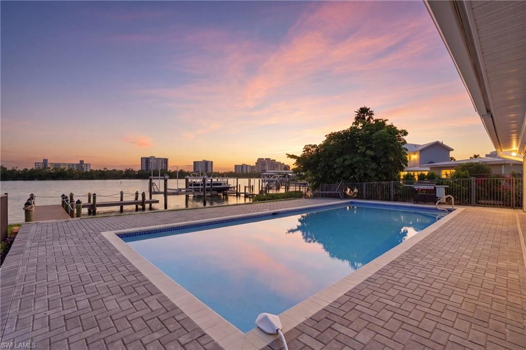 8009 Lagoon Road Fort Myers Beach, FL 33931 - Photo 42 of 48 pool at sunset