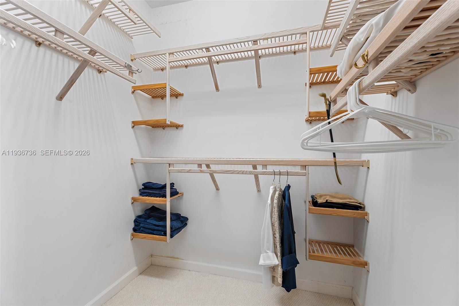 8185 Southeast Double Tree Drive Hobe Sound, FL 33455 - Photo 23 of 40 a view of storage and utility room with stairs