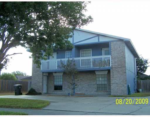 7222 Owen Court, Unit 1 Corpus Christi, TX 78413 - Photo 1 of 10 a view of a house with a garden