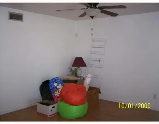 a view of an empty room and window