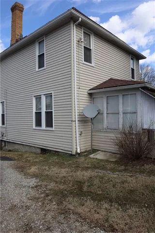 a house with yard in front of it