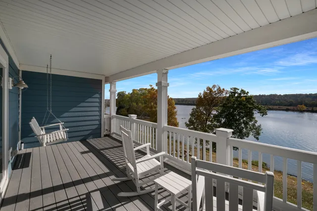 a view of balcony with furniture