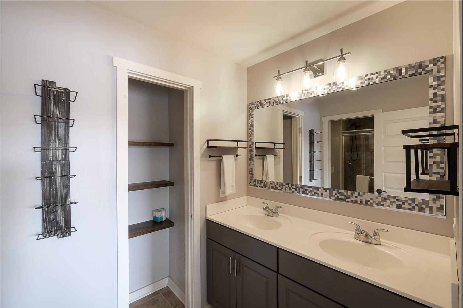 5 River Row Ottawa, IL 61350 - Photo 16 of 37 a bathroom with a double vanity sink and a mirror