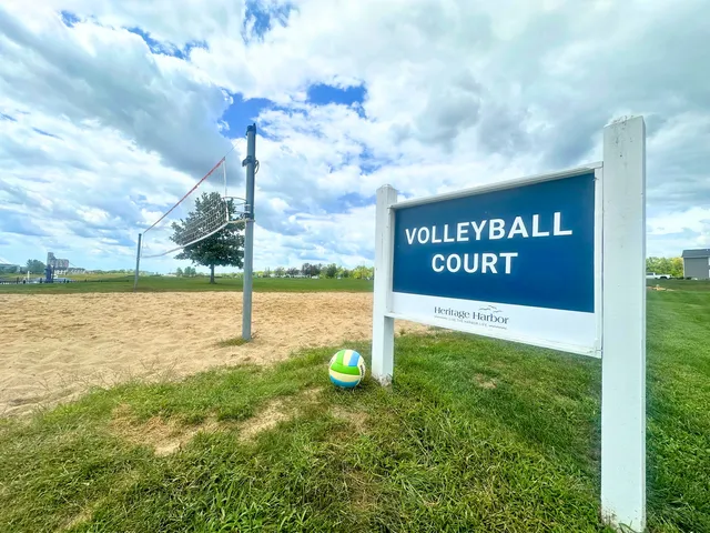 a view of a street with a yard