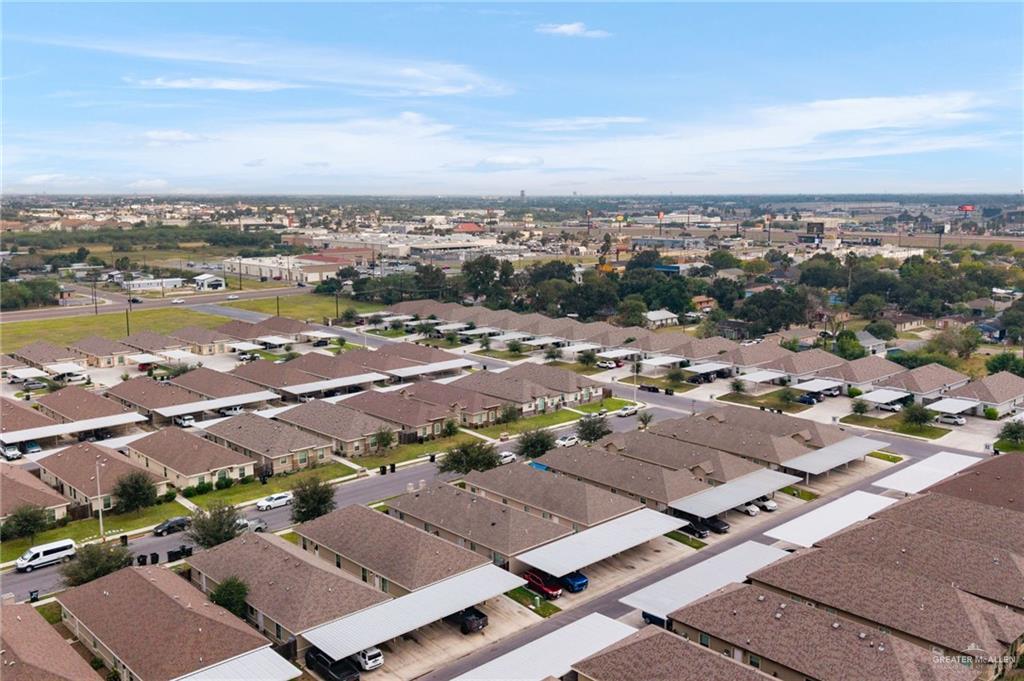 1801 Jackson Street Weslaco, TX 78599 - Photo 14 of 15 an aerial view of a city with lots of residential buildings and ocean view in back