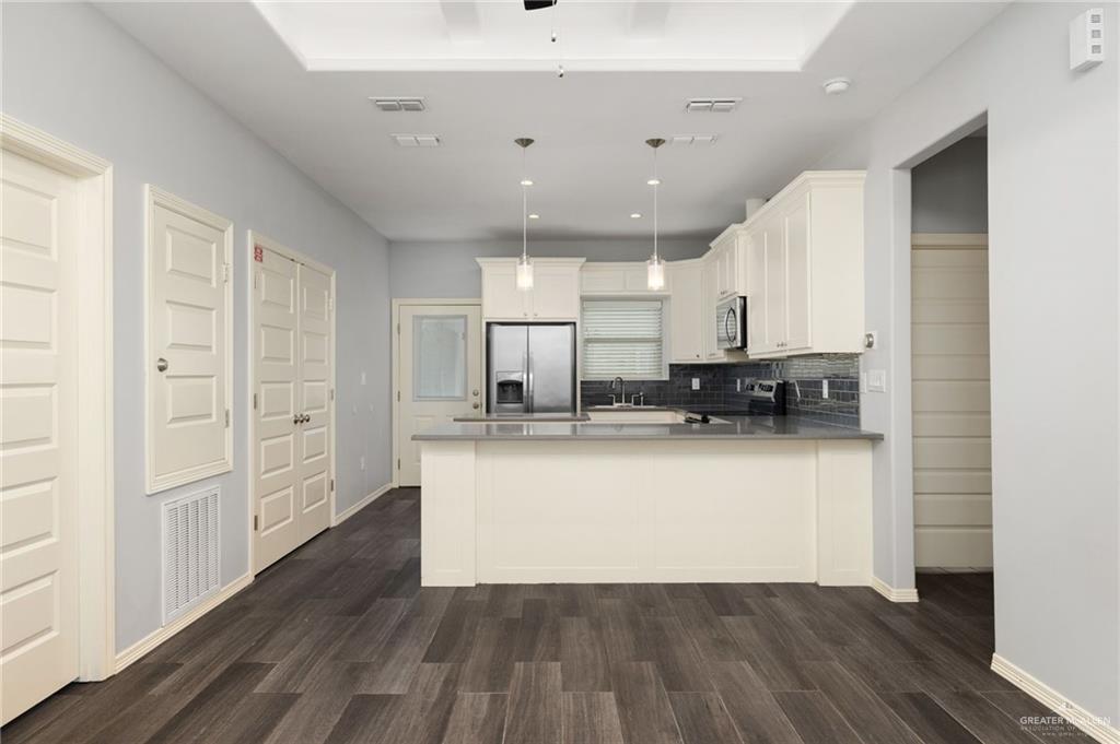 1801 Jackson Street Weslaco, TX 78599 - Photo 3 of 15 a view of kitchen with wooden floor