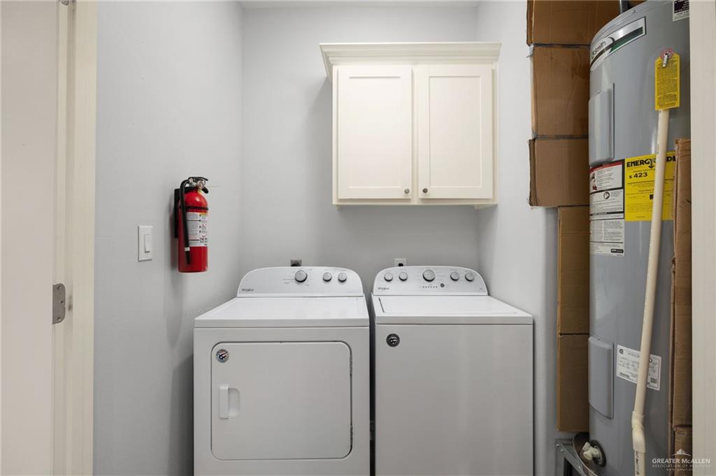 1801 Jackson Street Weslaco, TX 78599 - Photo 10 of 15 a utility room with dryer and washer