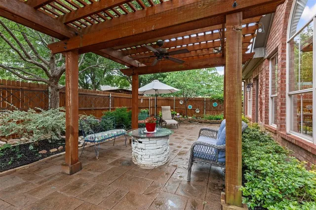 a front view of a house with garden and porch