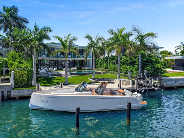 a garden with wooden area and lake view