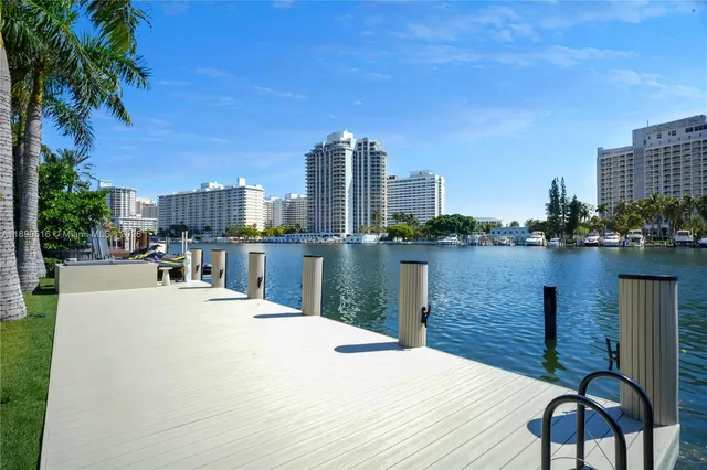 a swimming pool view with a lake view