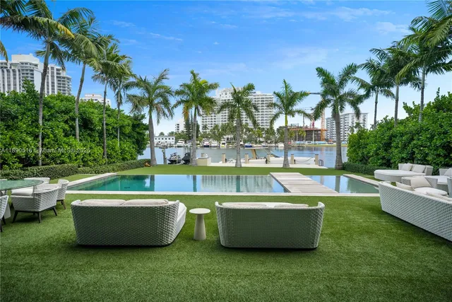 a view of a swimming pool with a patio